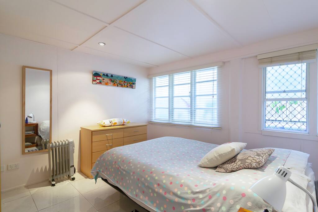 Bedroom with door is behind kitchenette. It's at one end of your unit and away from bathroom & toilet .
Unit is insulated due to being lower level of house. It tends to be cooler in summer and warmer in winter.