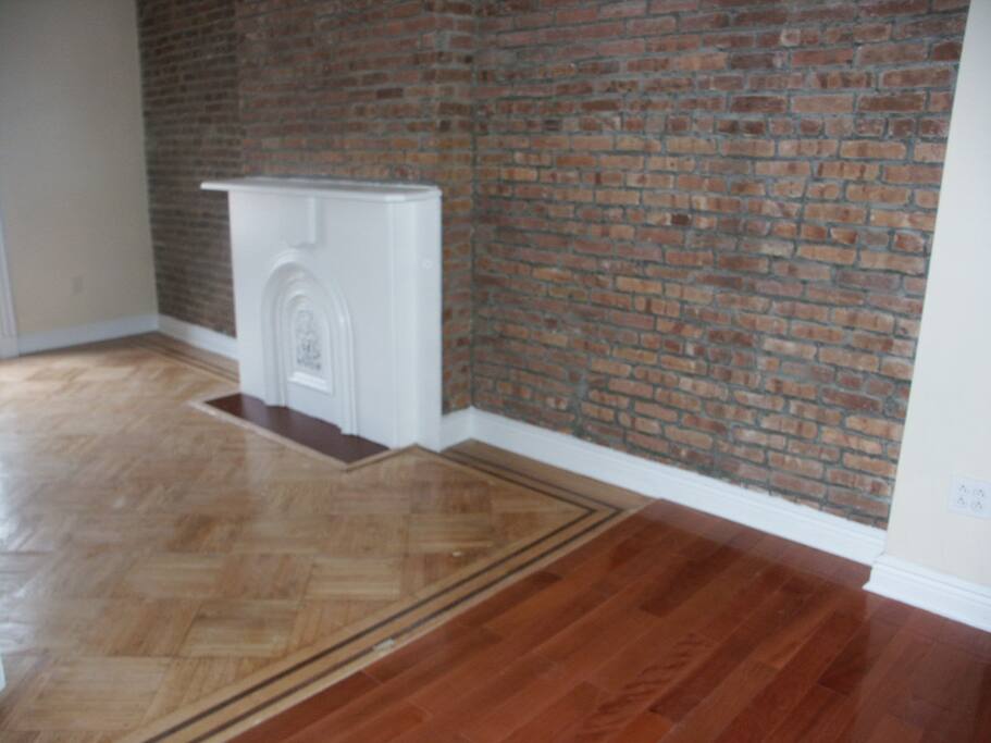 The dining room (now furnished). Furnished living room not shown.