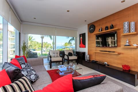 Luxury beach-front Condo with private beach club