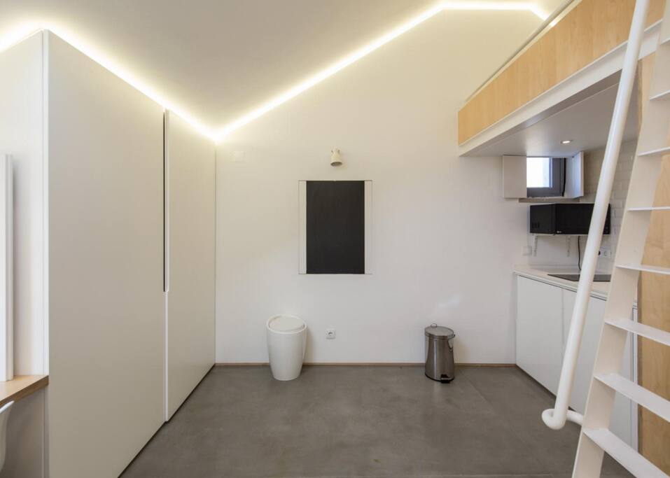 The blackboard pulls down to become a dining table where you can enjoy your meals, as well as having desk space should you need to do any work.