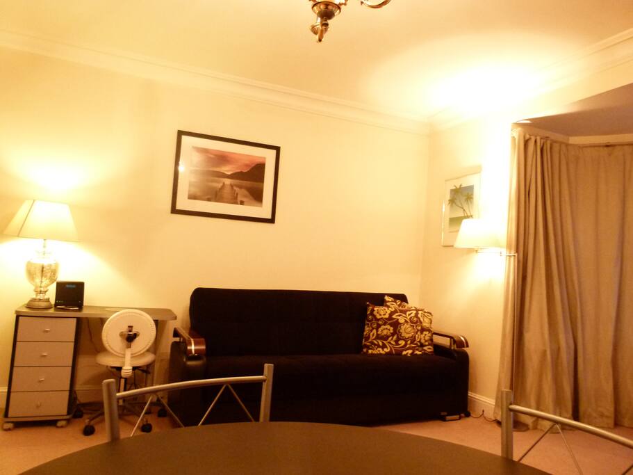 Lounge with sofa bed ,TV ,WiFi and Dining table