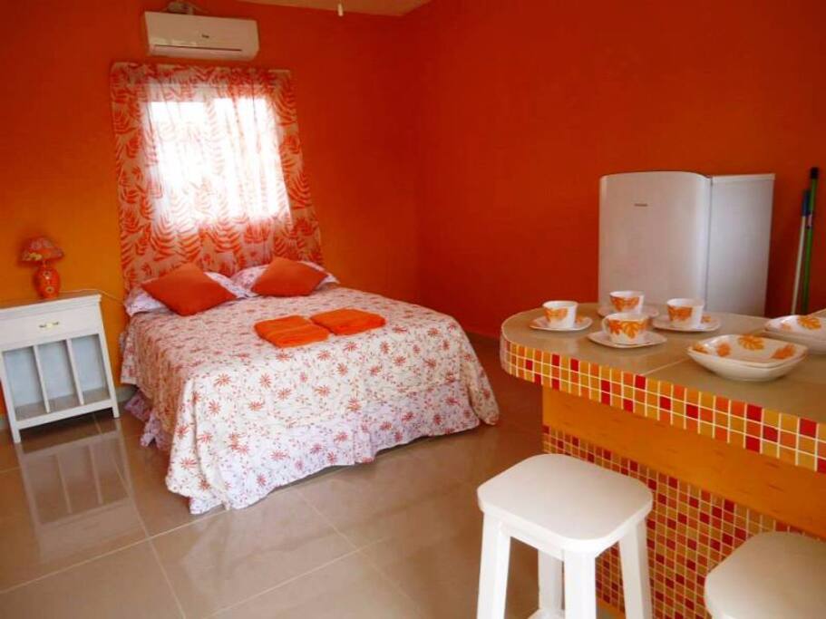 This is a nice room, very clean with a queen pillow top mattress.
A/C, kitchenett, all utensil to cook, eat, and drink. This has a shared bathroom. For one couple $38.50 tax incl.