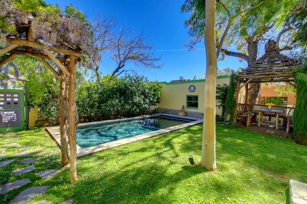 Indulge in this Refreshing Swimming Pool within the Fenced, Secluded Yard