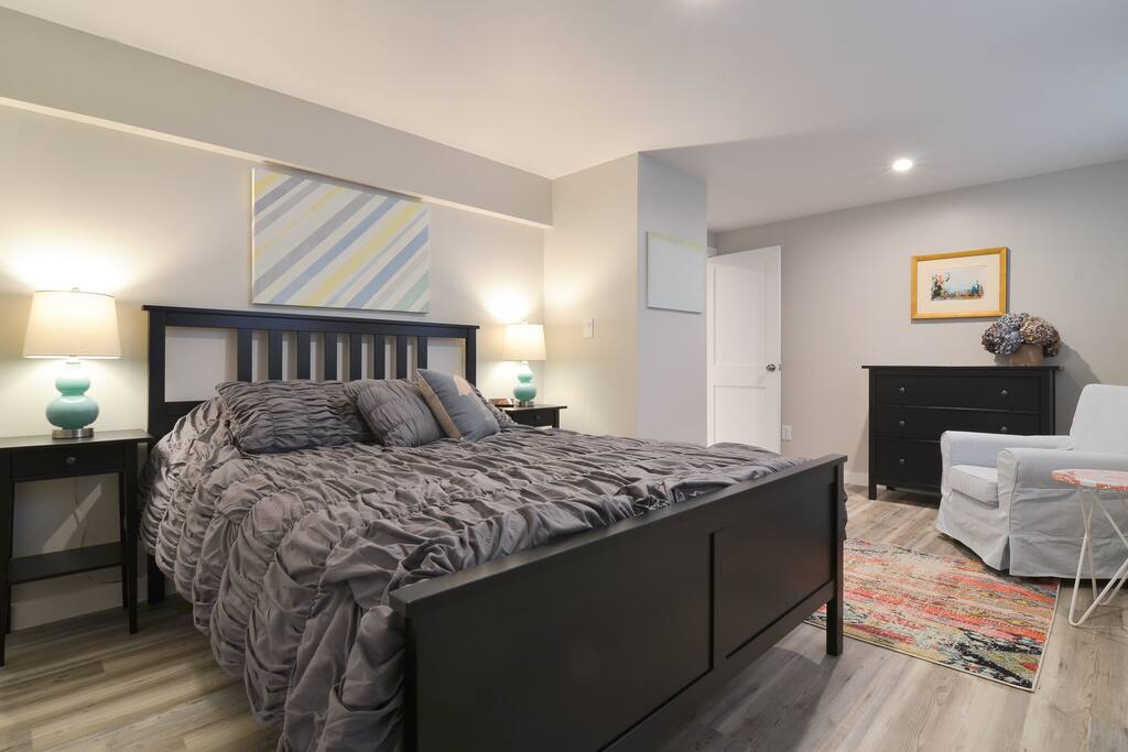One bedroom with new queen size bed and walk in closet.
