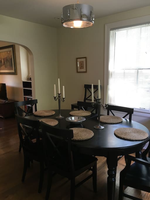 Spacious dinning room comfortably seats six.