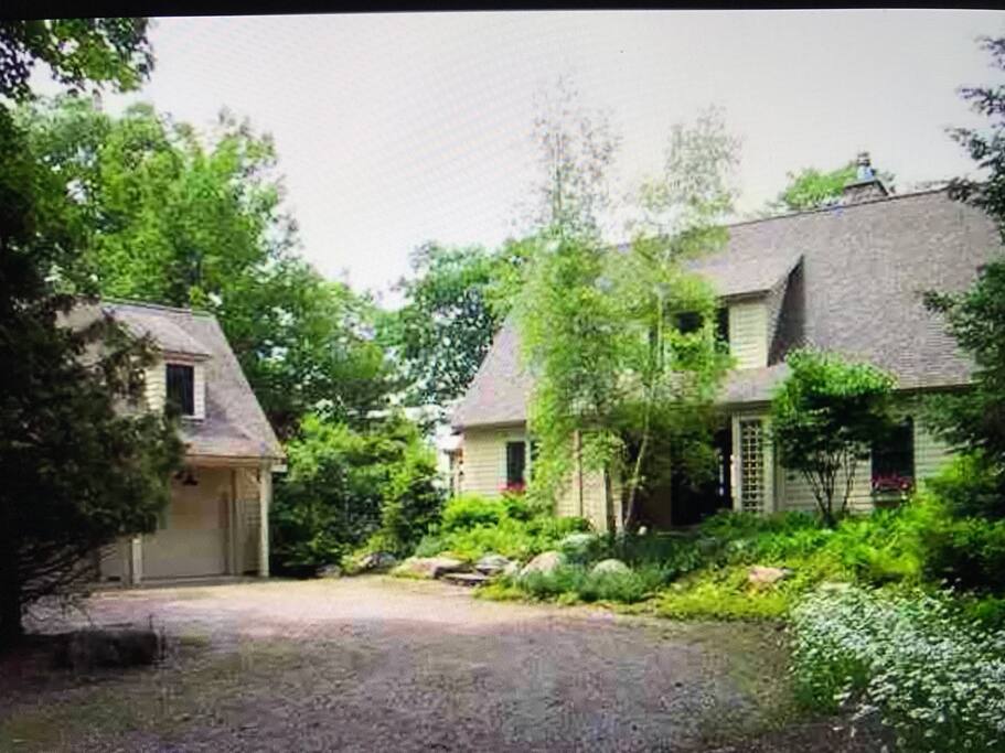 Front of house and the carriage house