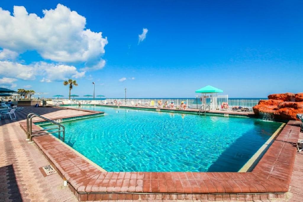 Waterfall feature, 10 foot heated pool, overlooking Daytona Beach.