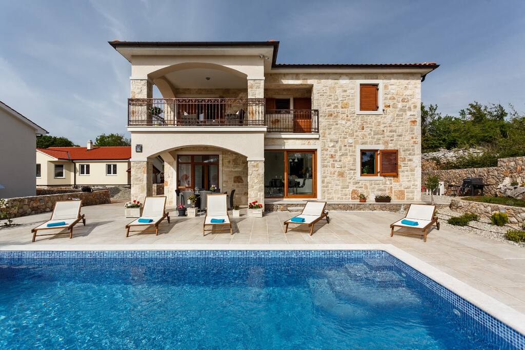 Outdoora view at swimming pool area and Villa