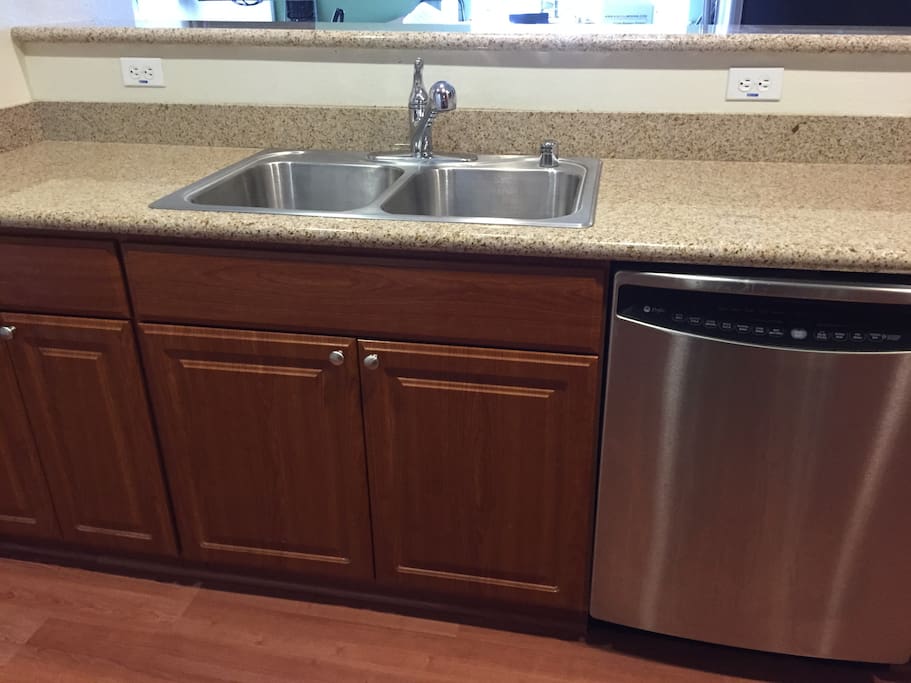 Stainless steel sink
Granite countertops
Stainless steel dishwasher