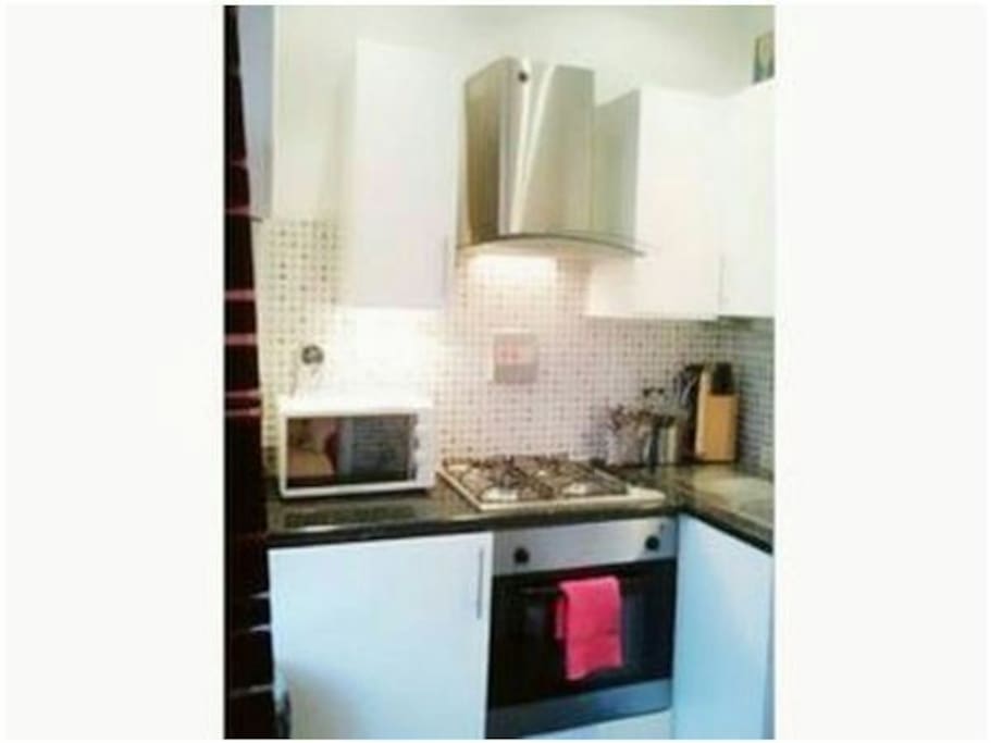 Kitchen with oven, washing machine gas cooling fringe & all you need...