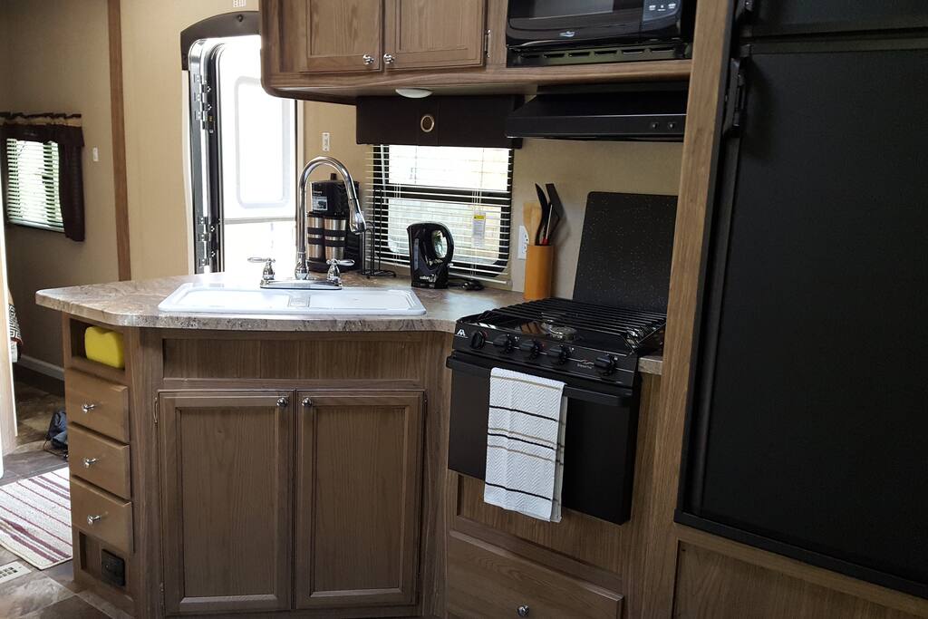 Kitchen complete with Microwave/stove/kettle/coffee maker