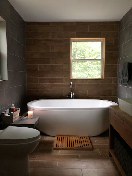 Part of the newly renovated bathroom. Inspired by the stone and wood surrounding Barn Dei Mona.
