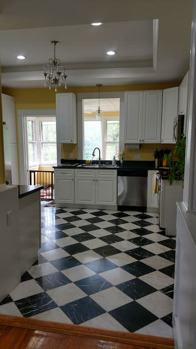 Large kitchen space with new appliances and counter spaces for daysss.
