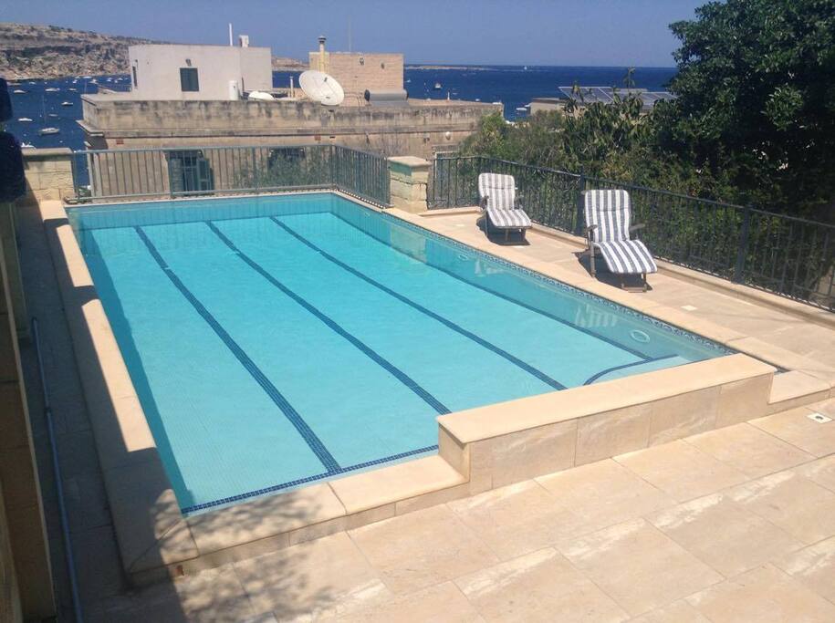 Infinity Pool with Sun Loungers