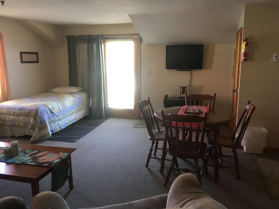 Living area with extra bed and private entrance.
