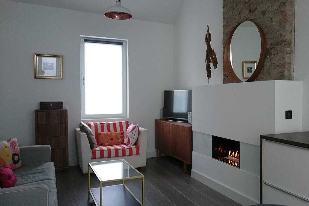 Huge windows make the living space feel light and airy.