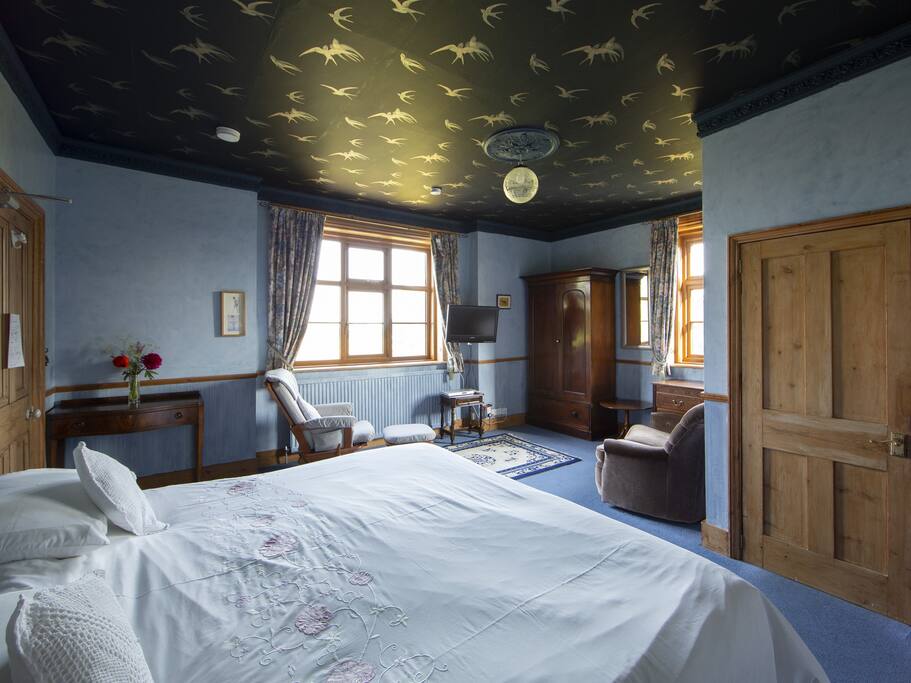 The Dog House bedroom with sitting area and ensuite