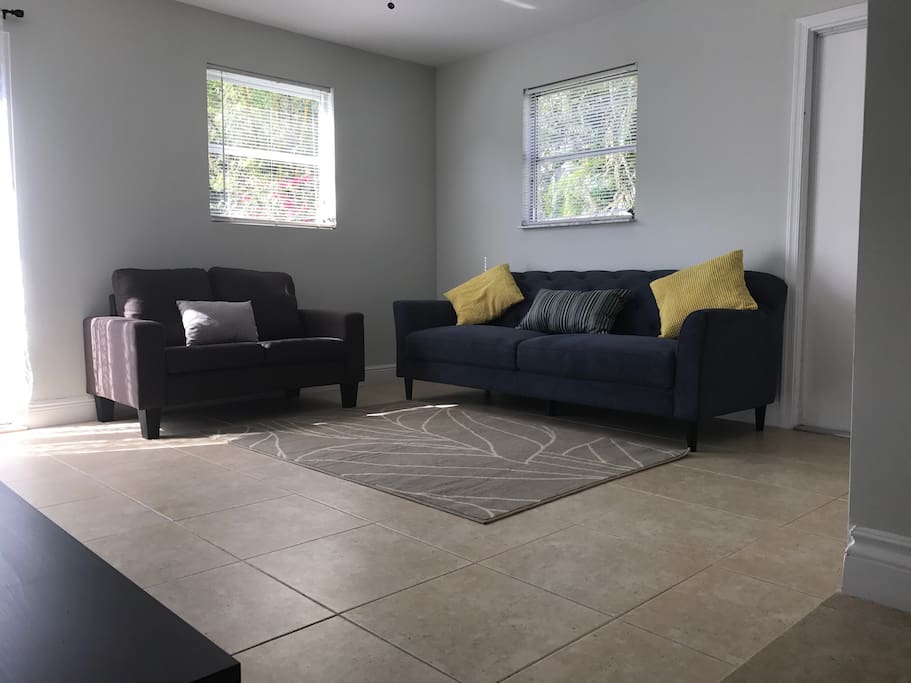 1st Living room with easy access to the large backyard