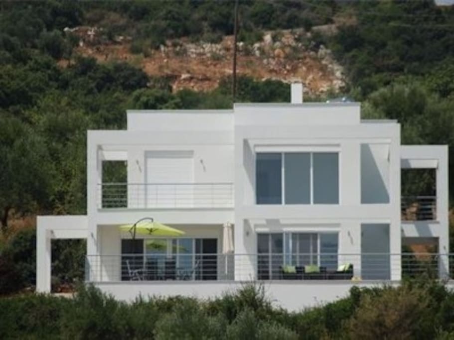 Contemporary style Greek villa on hillside, with no other development