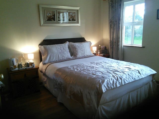 Large family home beside village.