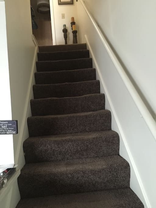 The stairways lead to 2 upstairs bedrooms