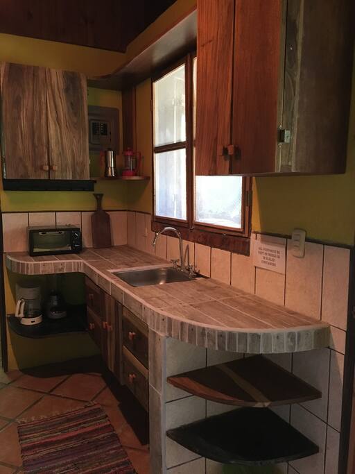 Use a stove-top espresso maker, French press or drip coffee machine to brew the perfect cup in the newly renovated kitchen.