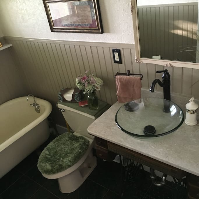 Soak in the claw foot bathtub downstairs or the oversized garden tub upstairs.