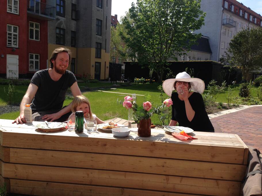 The backyard and us with our oldest daughter.