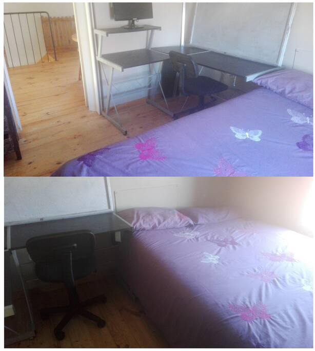 Upstairs room with double bed and workstation