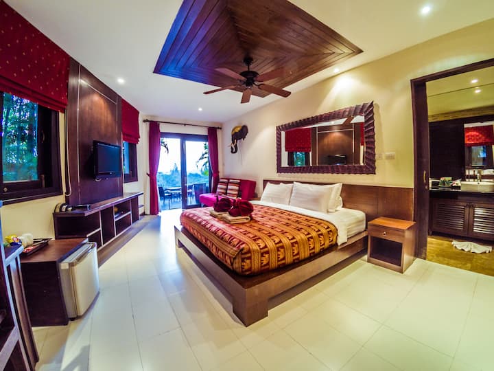 Dormitorio Lily Kingbed, sofá cama en suite