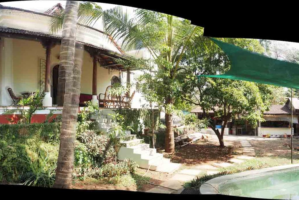 The porch overlooking the garden. Evening bird watching is a treat.