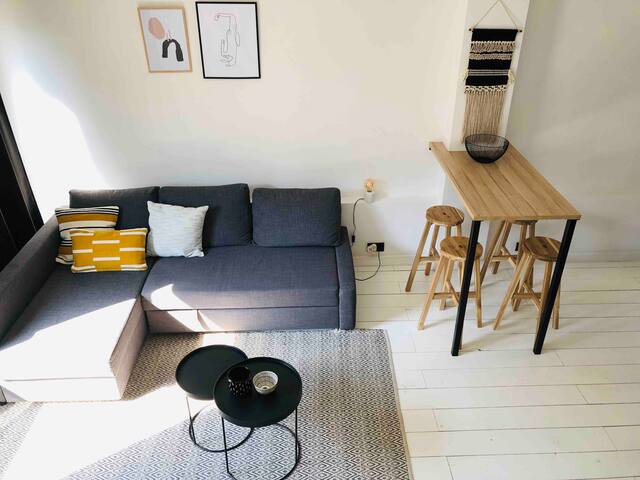 Trendy white duplex apartment in the city centre