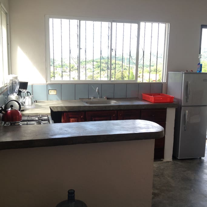 Fully equipped kitchen with sweeping views.