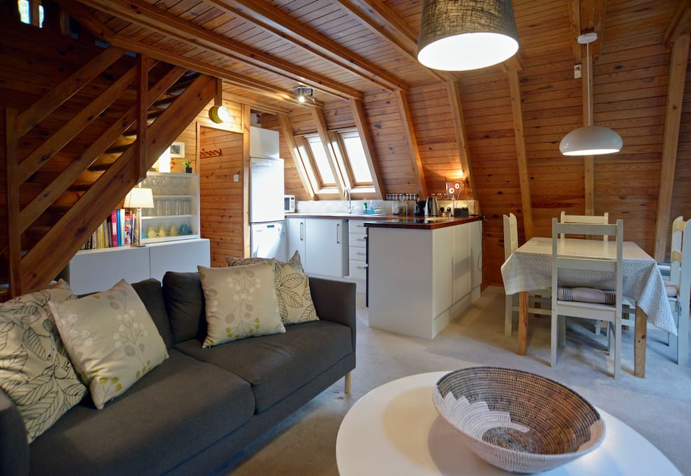 The open plan sitting room, dining room and kitchen.