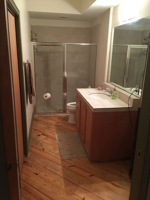 First floor downstairs full bath off of the kitchen and 4th bedroom
