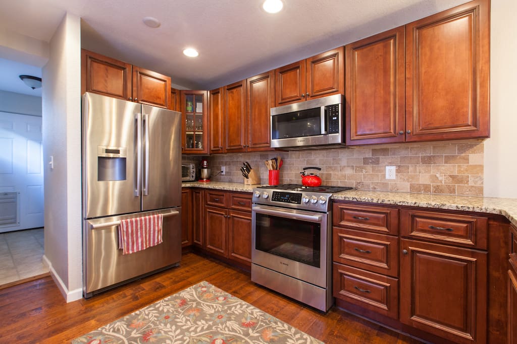 Kitchen with new stainless steel appliances