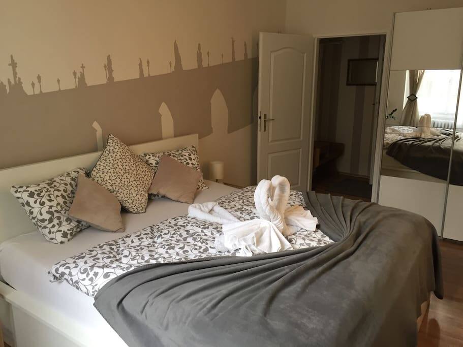 The bedroom is quite room with comfortable king-size double bed, wardrobe.