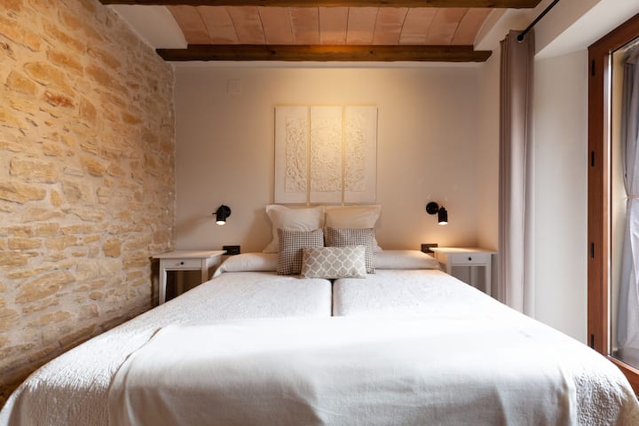 Bed lower double room.