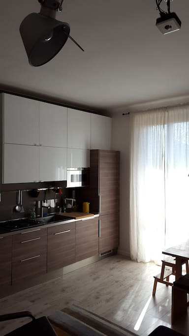 This is what you see next: the kitchen wall as part of the living room.