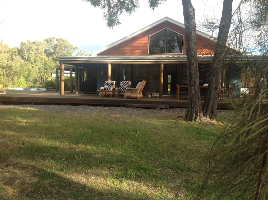 Back of House and rear deck. Winter view.