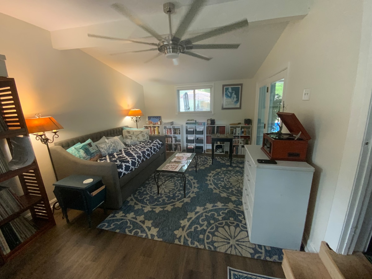 Media Room with Day Bed - 2 single beds.   This area is listed as the 4th bedroom.  It is a shared area that connects the kitchen and the backyard screen room.  It also has the 2nd entry to the house. Lots of games and puzzles 