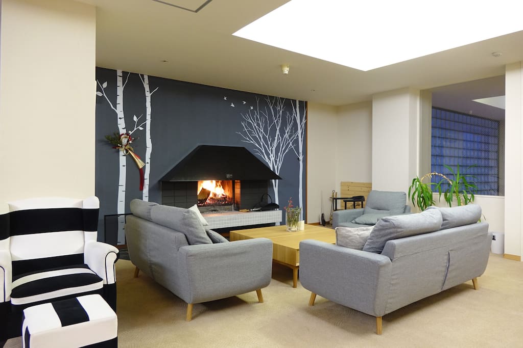 Snuggle up in front of the fireplace with a book, and a hot drink (or cold one) after a day in the powder and a soak in the onsen.