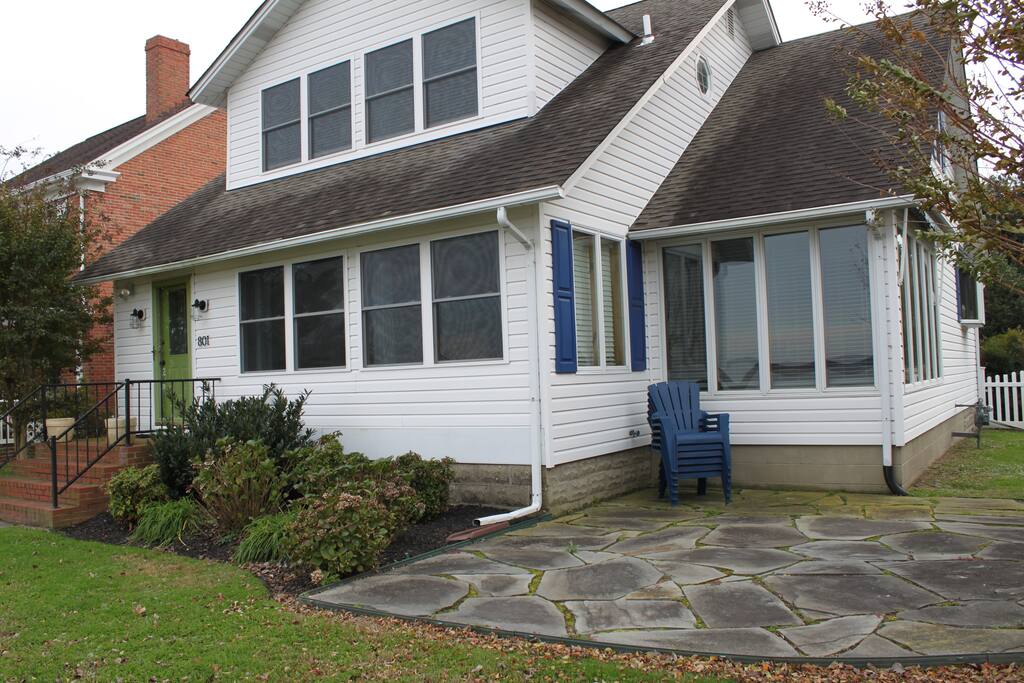 Stone patio in front yard