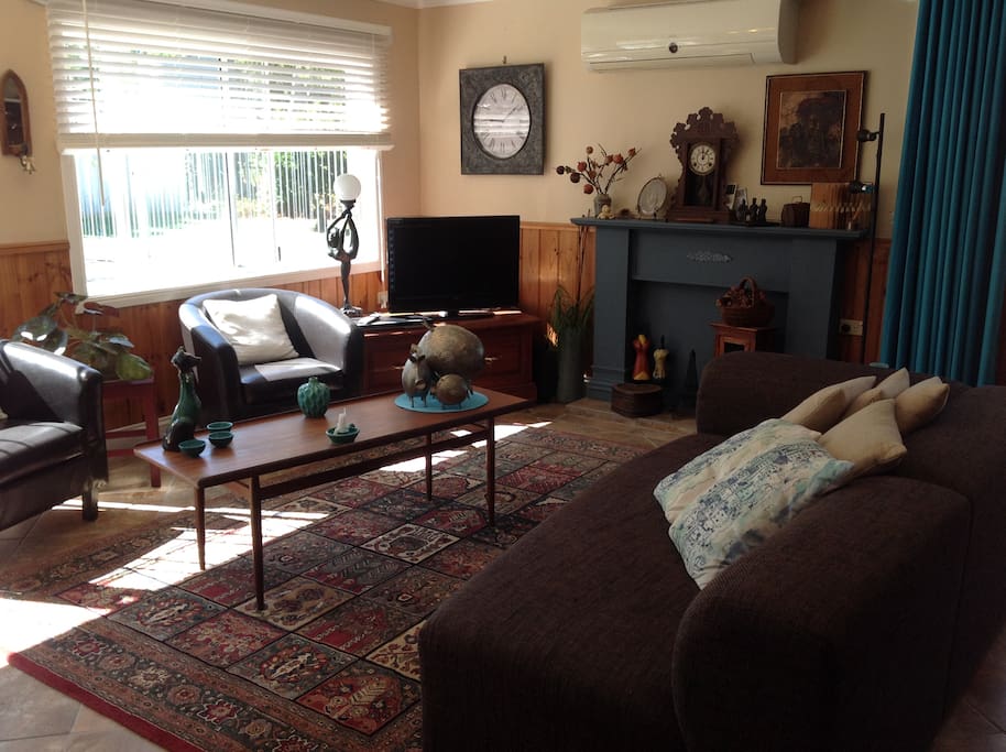 Spacious open plan living, with TV and CD player