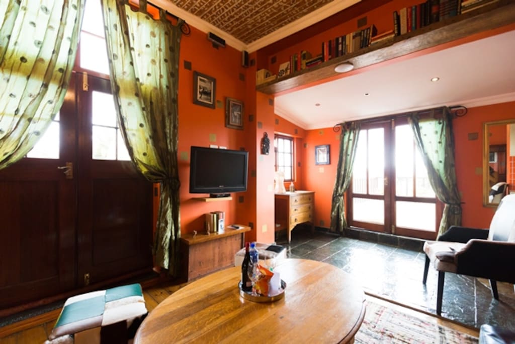 Lounge with access to wooden deck
