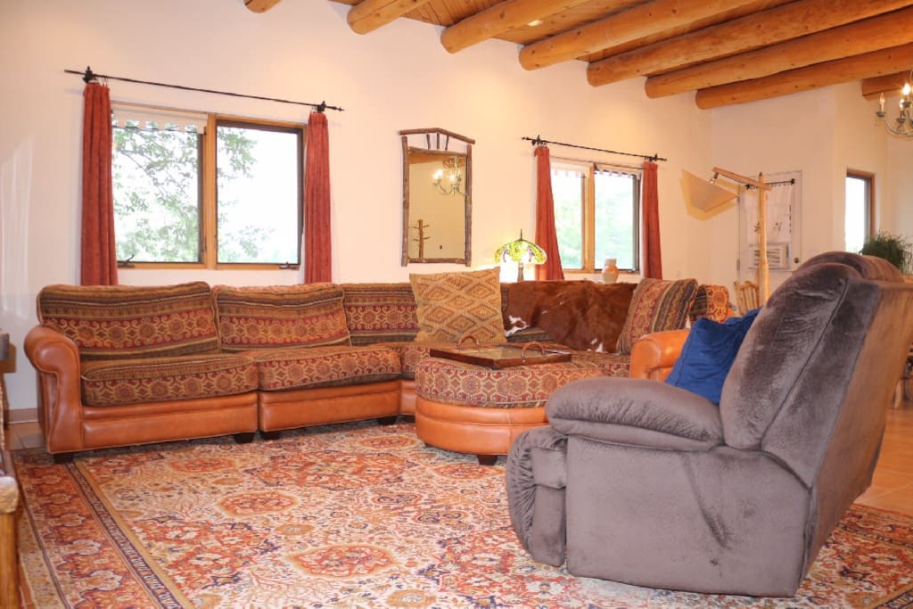 L-shaped super comfy sofa, loveseat recliner & upstairs windows to see the clouds go by