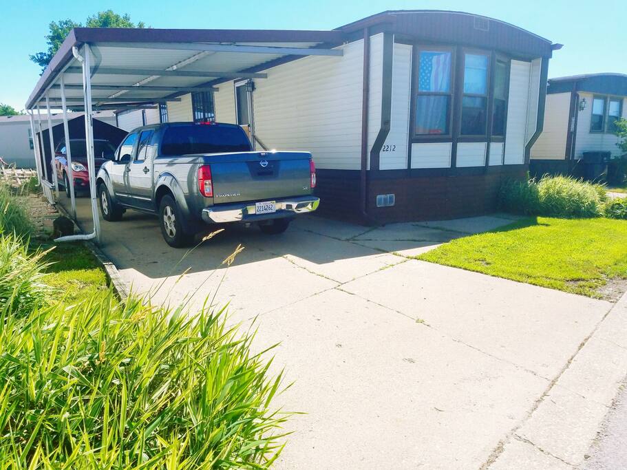 Three Car DriveWay + One parking spot available in front of Mobile home.