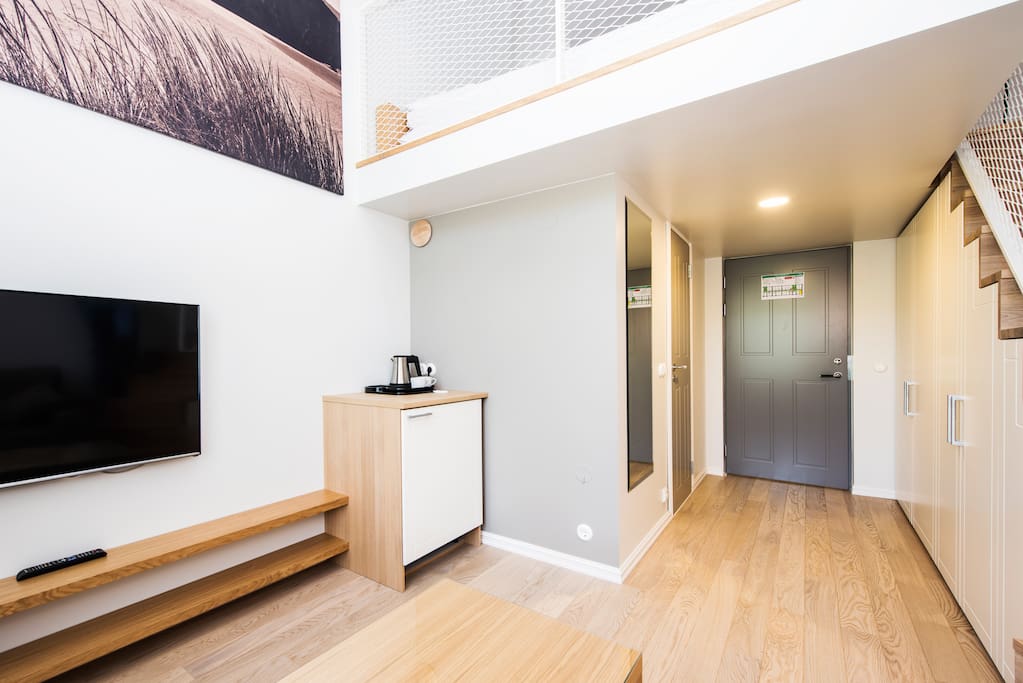 Your 2-story suite includes a large TV, Wifi and tea & coffee making facilities. Your 120 cm wide bed is upstairs.