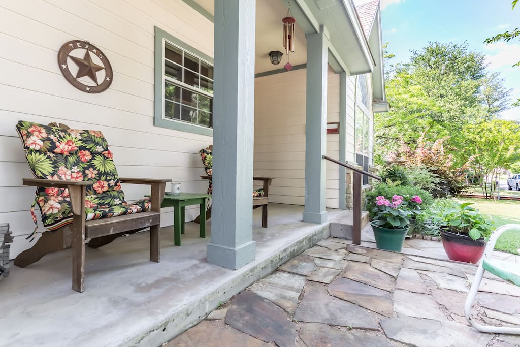 Relax and enjoy the quiet, wooded neighborhood from the front porch.