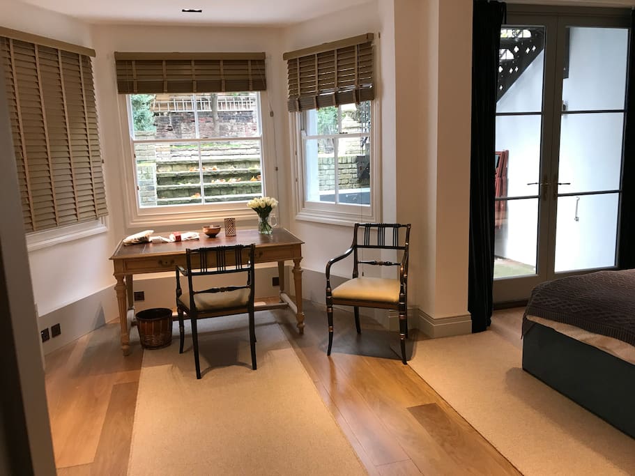 rear bedroom seating by day